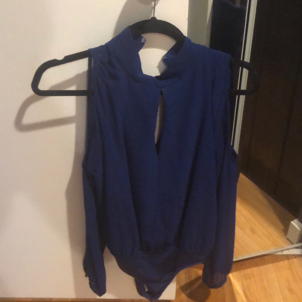 Blue bodysuit.